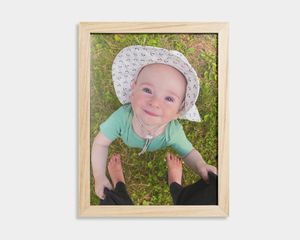 Poster eines Babys mit einem Bilderrahmen